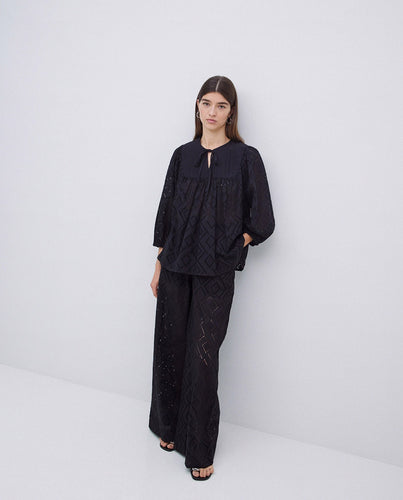 Black wide-leg embroidered trousers